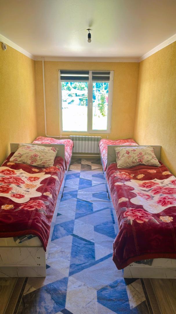 Photo of a shared room with four beds