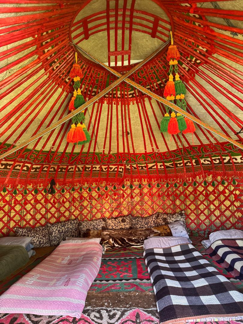 Photo of the interior of one of our yurt with four beds