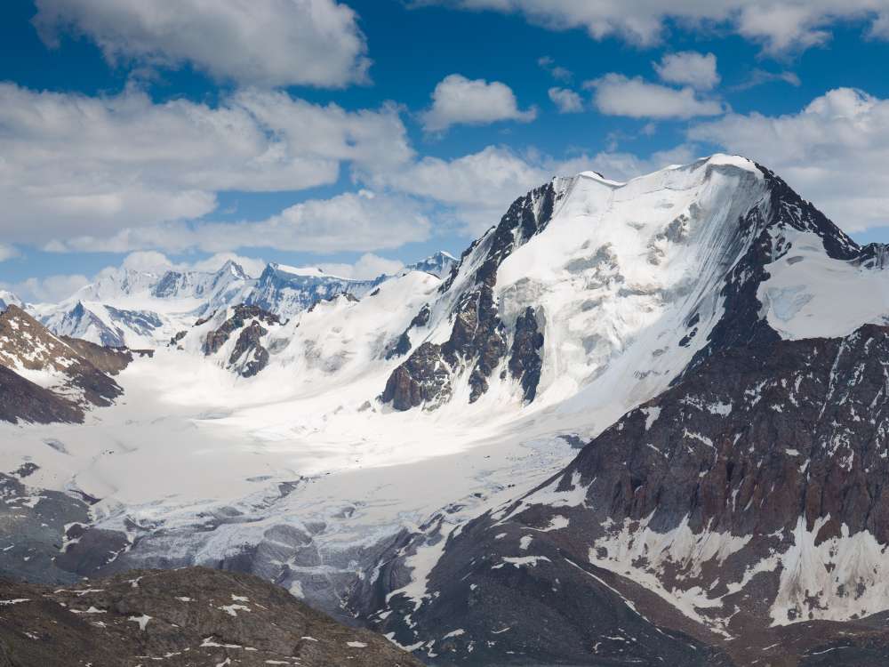 Photo of snowy mountains peaks